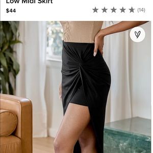 Lulu’s black skirt. Slinky, stretch fabric. Elastic waist.